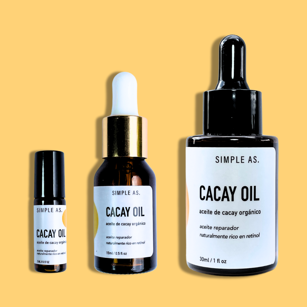 los tres tamaños del aceite de cacay con fondo plano.