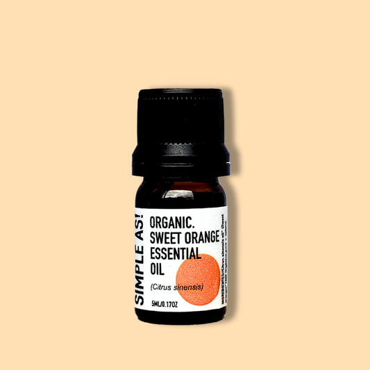 Aceite esencial de naranja con fondo plano